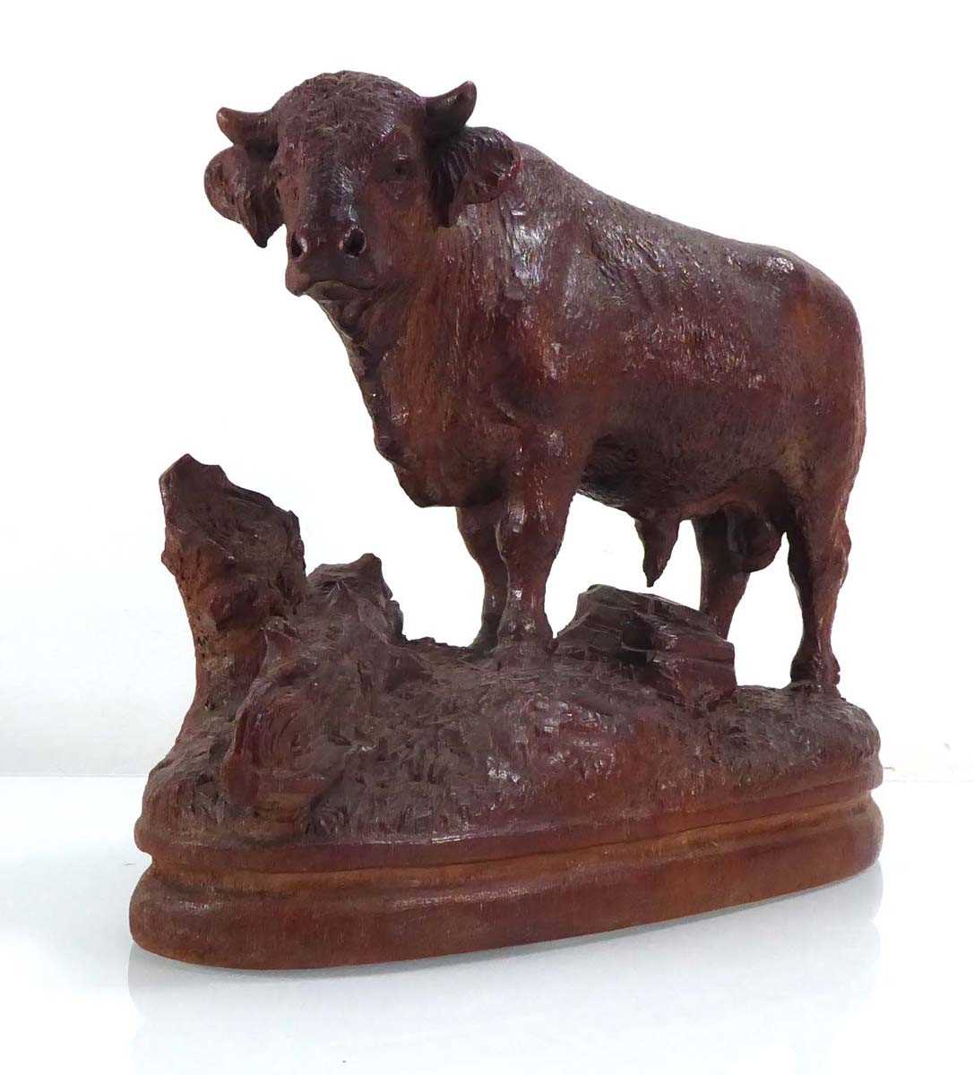 A late 19th/early 20th century 'Black Forest' carving modelled as a bull on a naturalistic plinth, - Image 5 of 7