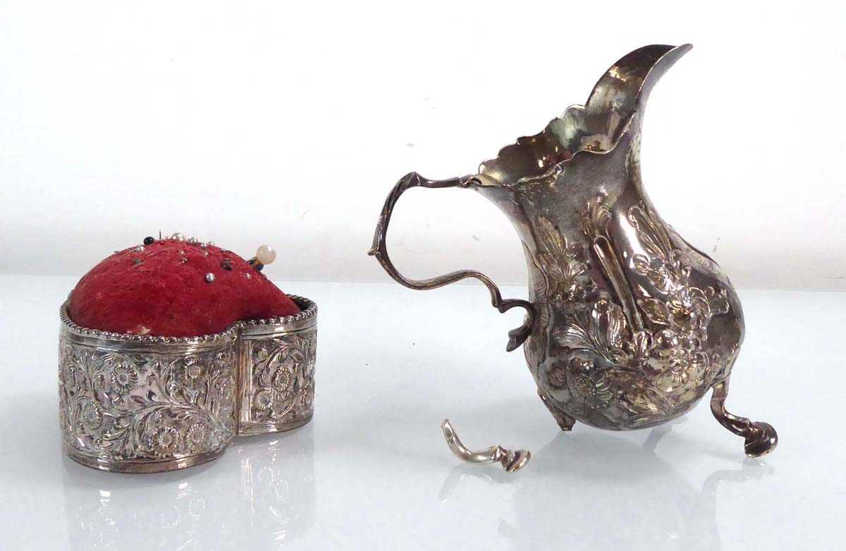 A Georgian silver and repousse decorated cream jug on hoof feet, hallmarks rubbed, h. 10 cm, 3 - Image 2 of 3