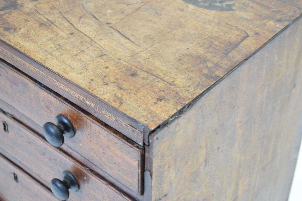 A Georgian mahogany chest of four long graduated drawers, marquetry work to the frieze, on bracket - Image 2 of 13