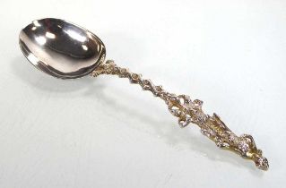 A Dutch metalware rats tail serving spoon with figural finial, l. 17.5 cm, 1.3 ozs