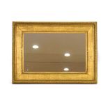 A rectangular giltwood wall mirror, 80 x 112 cm The aperature for the mirror is 21 x 33 inches.