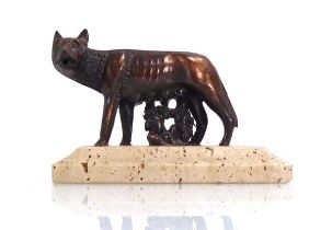 A 20th century bronzed figure modelled as the 'Capitoline Wolf' on a plinth base, w. 14 cm