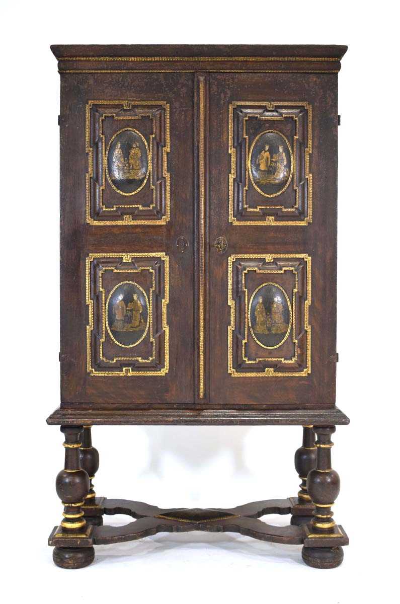 A chest-on-stand in the 17th century manner incorporating later elements, the pair of doors with
