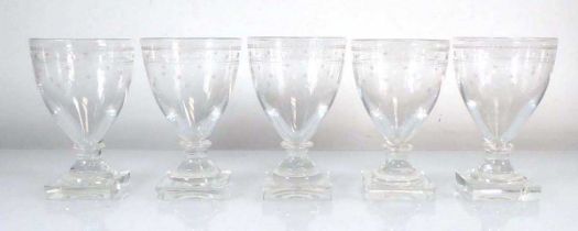 A set of five late 19th/early 20th century engraved glass rummers on square bases, h. 12.5 cm (5)