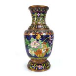 A late 19th century clossoine vase decorated with flowering shrubs and geometric bands, h. 31 cm