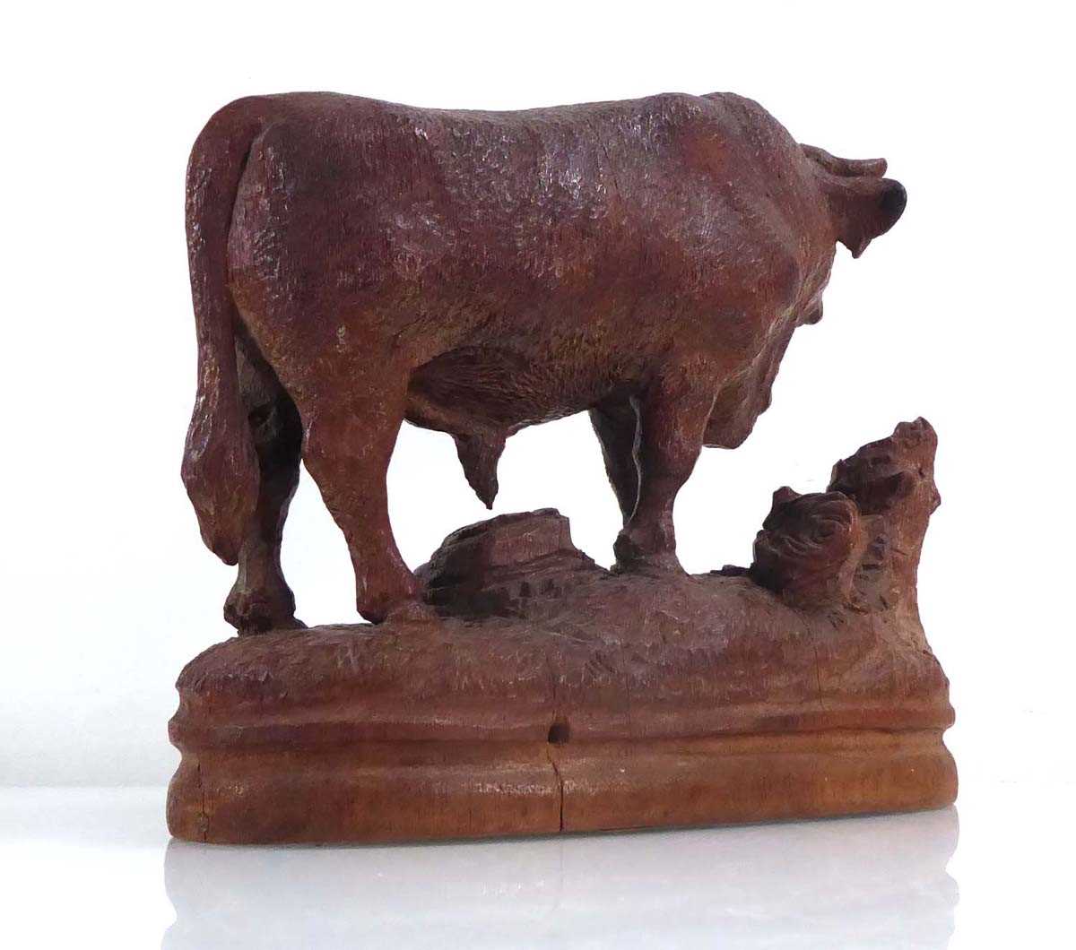 A late 19th/early 20th century 'Black Forest' carving modelled as a bull on a naturalistic plinth, - Image 2 of 7