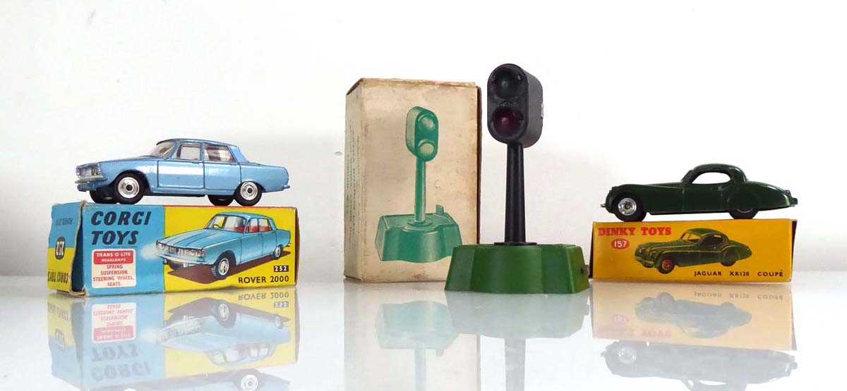 Three models comprising: Corgi 252 Rover 2000, Dinky 157 Jaguar XK120 coupe and Astra miniature