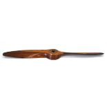 A laminated mahogany propeller with copper mounted leading edges reputedly taken from a de Havilland