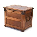 An elm, oak and walnut silver chest with brass mounts and handle, the lid opening to reveal a