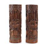 A pair of Chinese Export carved bamboo brush pots, h. 30.5 cm These are uncarved to the backs. There