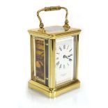 A French carriage timepiece, the movement stamped R & Co., the enamelled face inscribed '