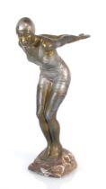 An Art Deco style aluminium figure modelled as a bather with a brown patinated body, unmarked, h. 25