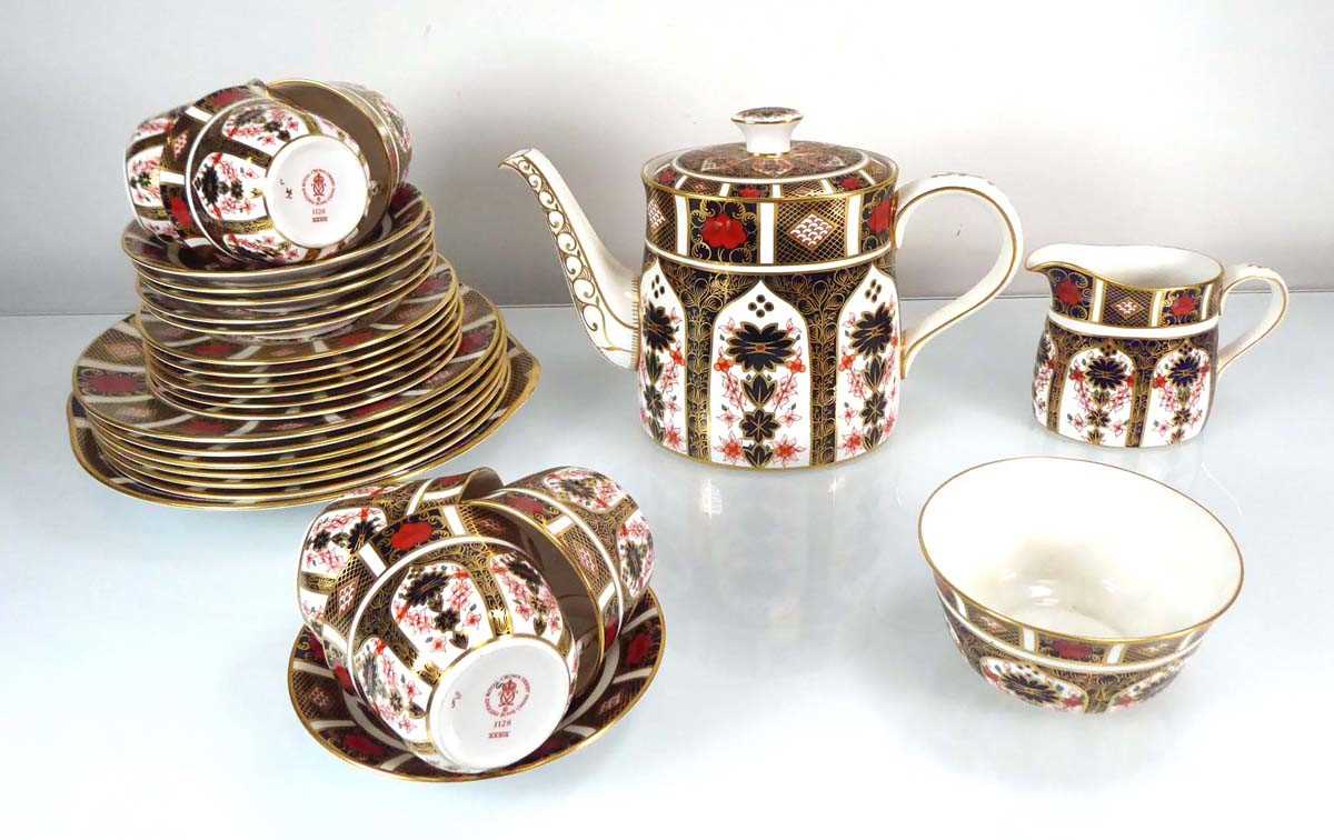 A Royal Crown Derby six-sitting tea service decorated in the 1128 pattern (qty) Blue ground very