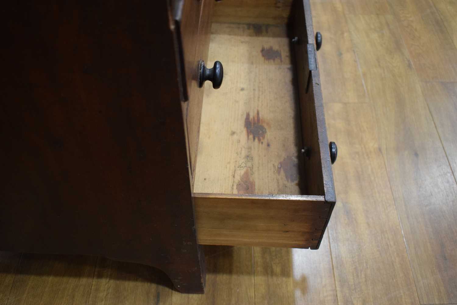 A Georgian mahogany chest of four long graduated drawers, marquetry work to the frieze, on bracket - Image 9 of 13