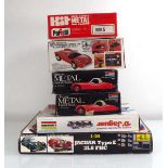 Six 1:24 scale plastic and metal car kits including: AMT Cobra Roadster, Polistil Jaguar XJ6L,