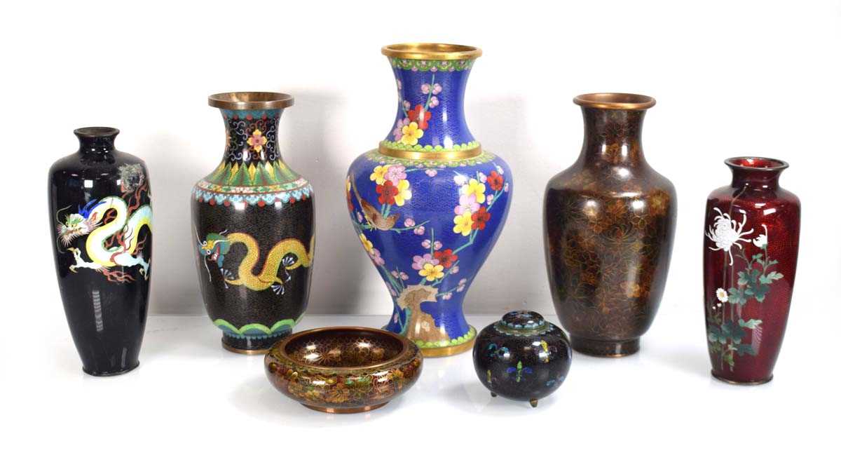 A group of cloisonné vases and bowls including a large baluster vase decorated with birds and