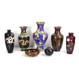 A group of cloisonné vases and bowls including a large baluster vase decorated with birds and