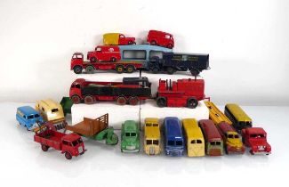 A group of loose Dinky and other commercial models including buses, SNFC delivery vehicle, flatbed