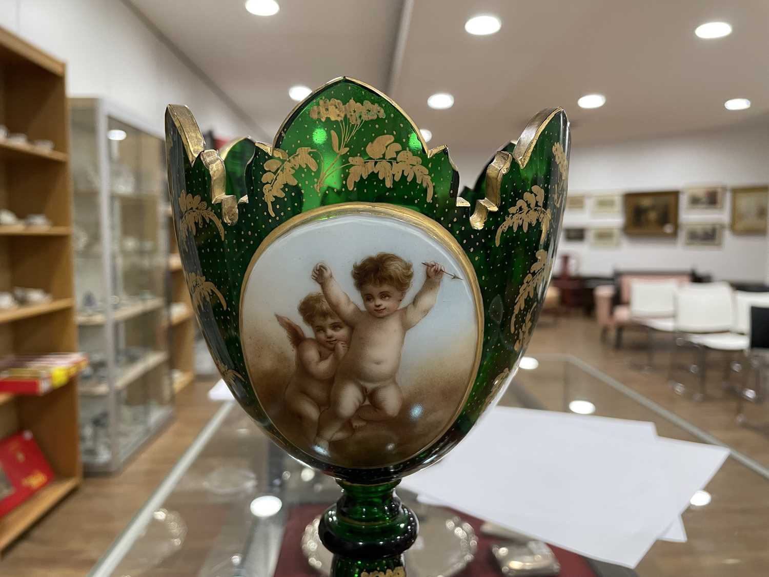 A Bohemian green glass vase of goblet form decorated with a pair of putti within a gilt fern - Image 11 of 26