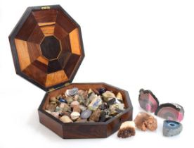 A collection of geological specimens including granite, Cornish tin ore, quartz crystal,