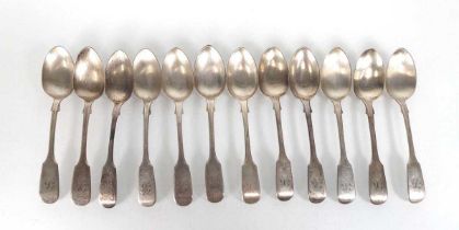 A set of twelve Victorian silver fiddle pattern teaspoons, maker CB, London 1861, 8.7 ozs (12)