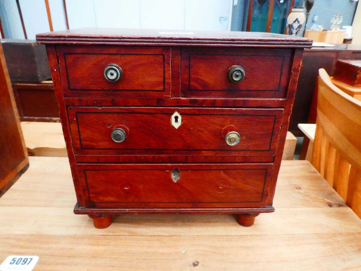 An apprentice chest of two short over two long drawers, 29 x 15 x 27 cm *Ivory Submission