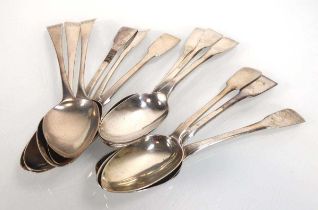 Twelve Georgian and later silver fiddle and old English pattern table spoons, various dates and