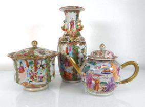 Three items of Cantonese ceramics comprising a teapot, a vase and a covered container, max h. 25