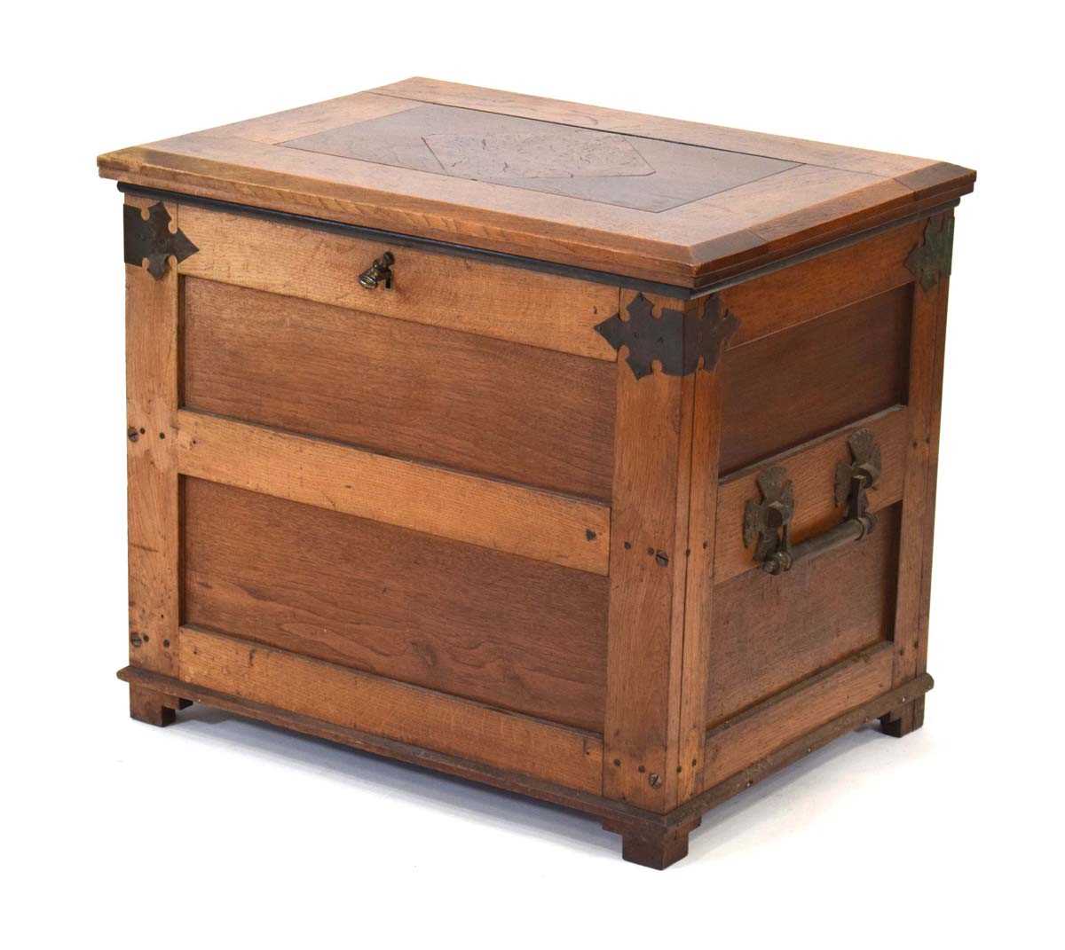 An elm, oak and walnut silver chest with brass mounts and handle, the lid opening to reveal a