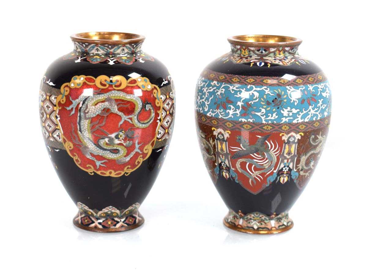 A near pair of cloisonné vases of slender form, each decorated with serpents, birds and floral