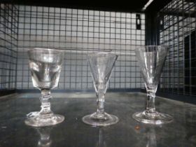 Three 19th century drinking glasses of trumpet and thistle form, max h. 11.5 cm (3)