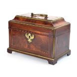 A late 18th/early 19th century mahogany and brass mounted box of casket form with bracket feet,