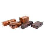 A group of five various boxes including a walnut and marquetry box, two pen boxes, a draughtsmen box