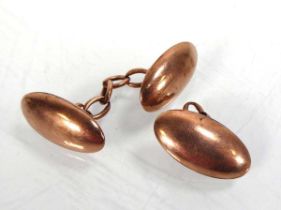 A 9ct rose gold cufflink, Chester hallmarks and a part cufflink, overall 4 gms (2)