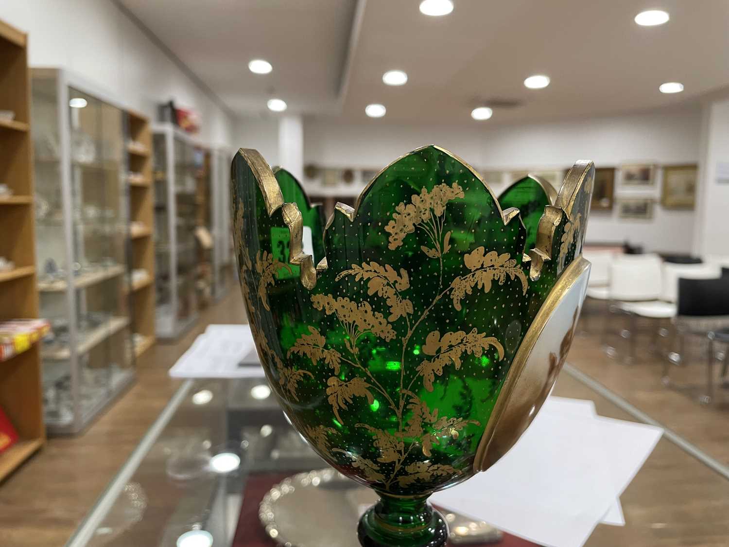 A Bohemian green glass vase of goblet form decorated with a pair of putti within a gilt fern - Image 15 of 26