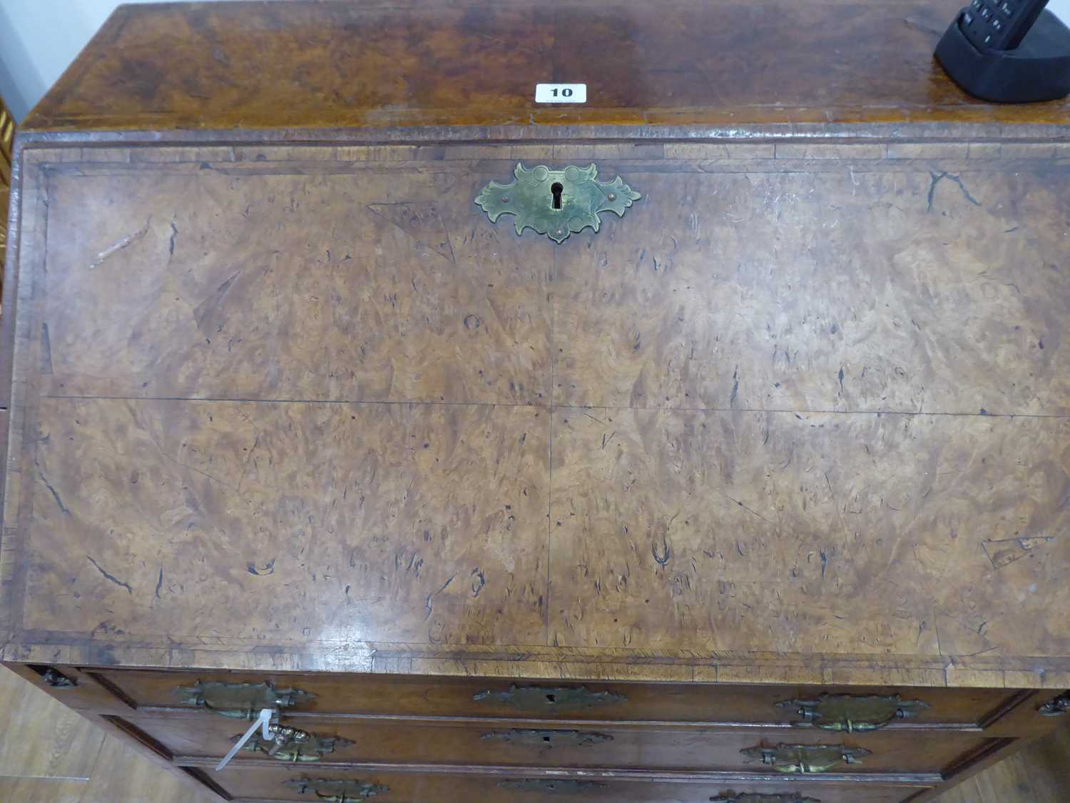 A walnut and feather banded bureau of small proportions, the fall-front over four long graduated - Image 14 of 20