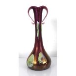 A Loetz style two handled pink and opaline iridescent glass vase of flared Art Nouveau design, in