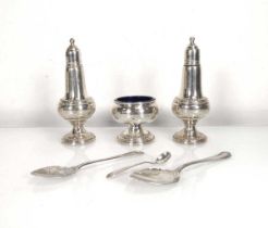 A late 20th century silver three piece cruet set, Reed & Barton and three silver spoons (6)