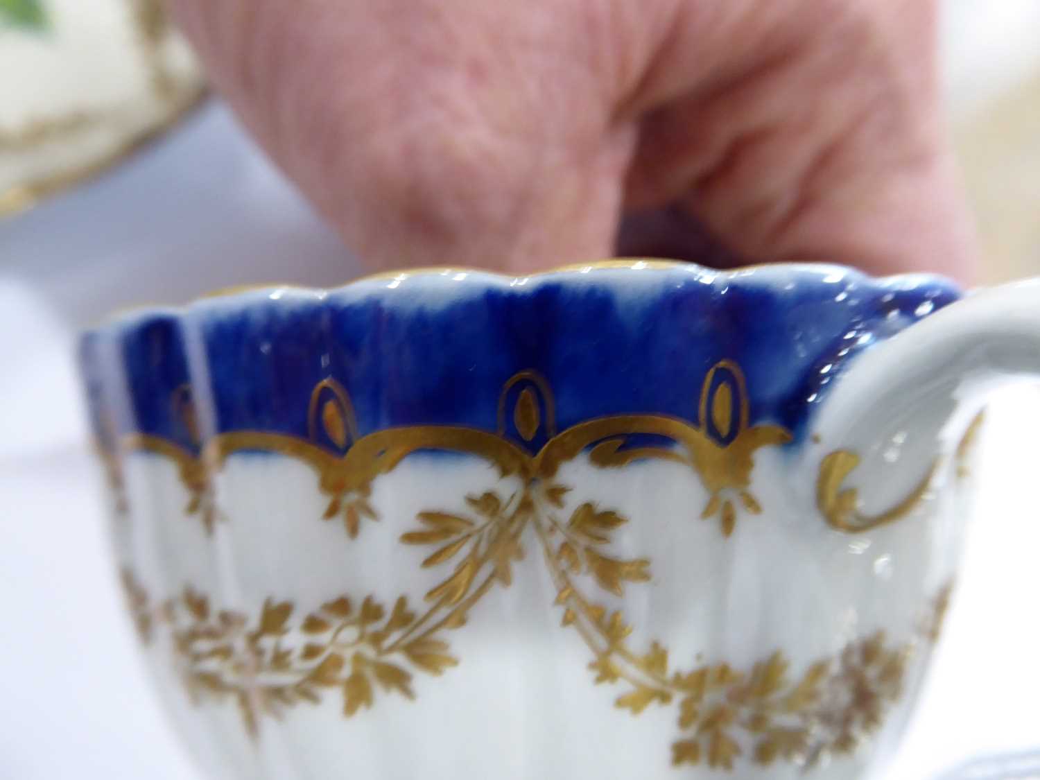 An early Worcester tea cup and saucer dish, each decorated with an exotic bird with a blue and - Image 4 of 6
