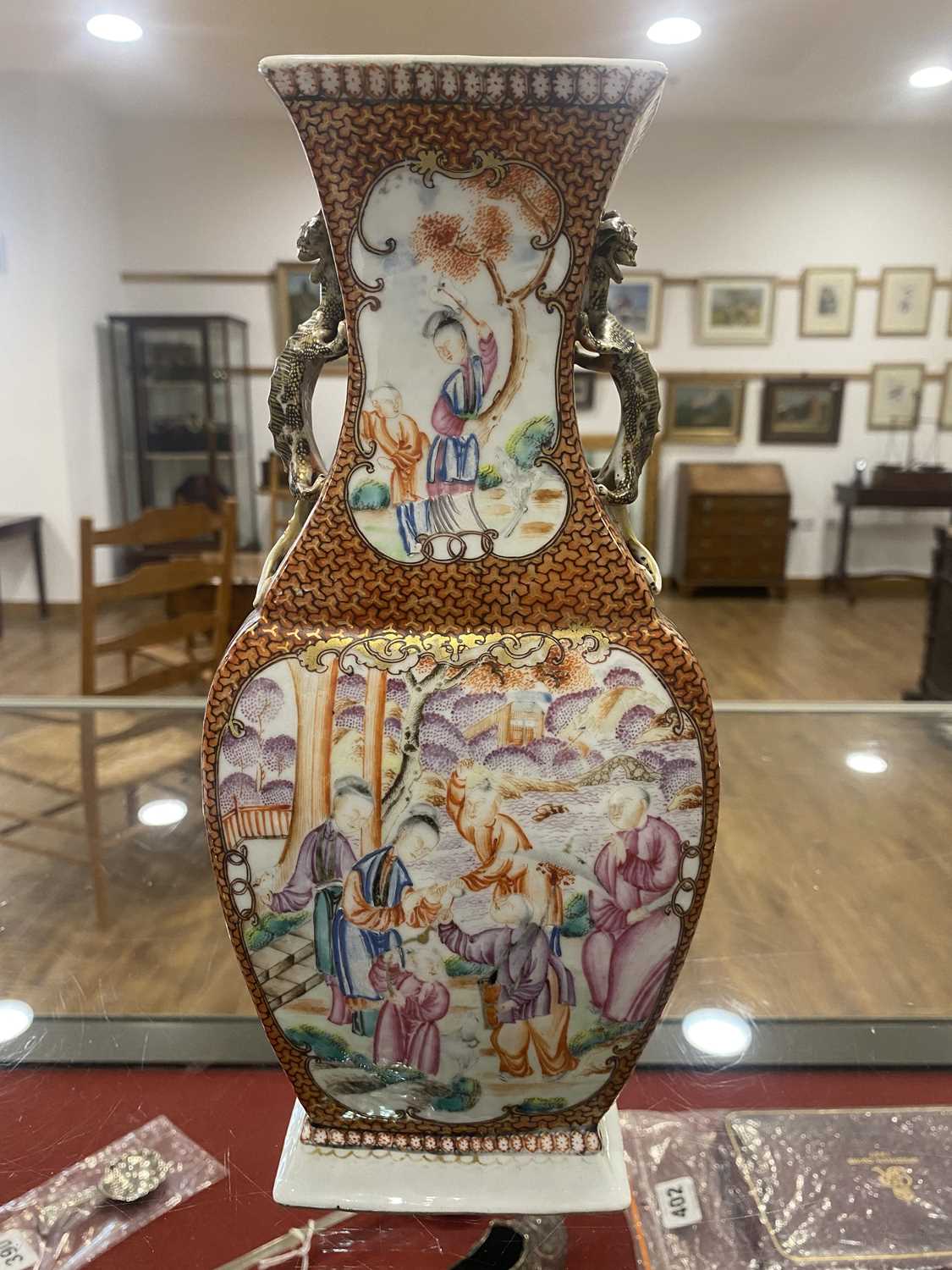 A Chinese Export slab vase decorated in coloured enamels with figures at leisure within a rust - Image 11 of 18