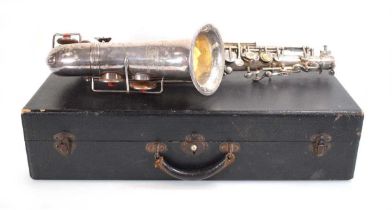 A boxed Jacques Albert Fils saxophone, silver-plated with fittings