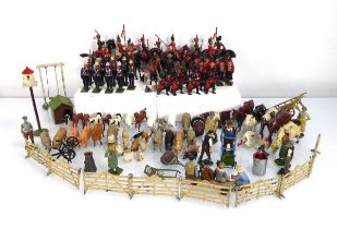 A collection of cast metal figures including Britains mounted equestrian examples, Scouts,