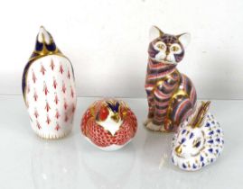 Four Royal Crown Derby paperweights modelled as a cat, a penguin, a pheasant and a rabbit, max h.