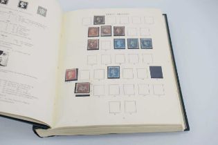 An album of Victorian and later stamps including a Penny Black, numerous Penny Reds etc.