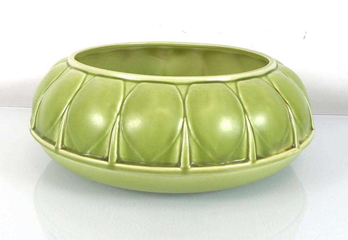 A Shorter & Sons shallow jardinière decorated in a pale green glaze, d. 25 cm