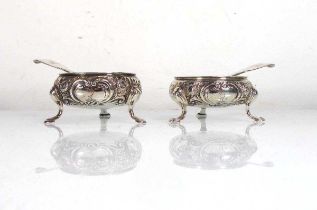 A pair of George III silver salts of squat bun shaped form, each on three hoof feet, makers marks