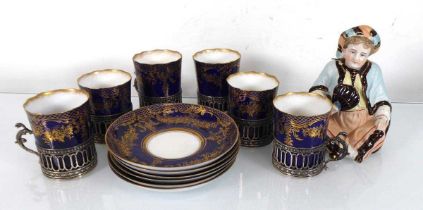 Six blue and gilt decorated Staffordshire coffee cans and saucers, the cans each with a silver