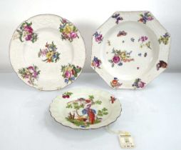 A Chelsea cabinet plate decorated with floral sprays, d. 23.5 cm, together with a similar