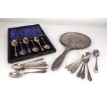 A set of six silver apostle spoons, cased, a set of twelve silver teaspoons, a single silver