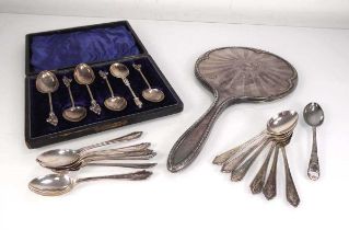 A set of six silver apostle spoons, cased, a set of twelve silver teaspoons, a single silver